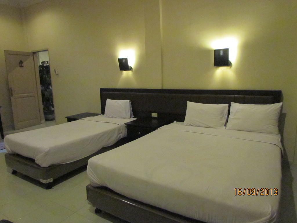 Hotel Carolina Transit à Medan Chambre photo