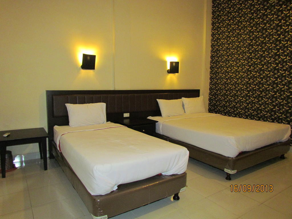 Hotel Carolina Transit à Medan Chambre photo